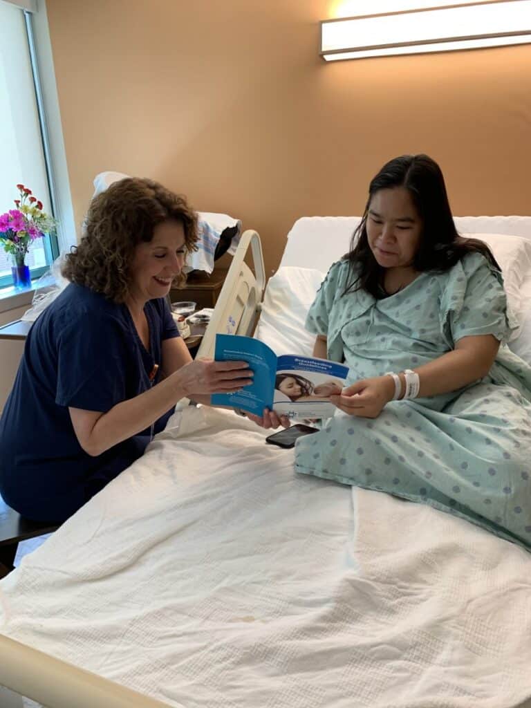 expectant mother in hospital bed